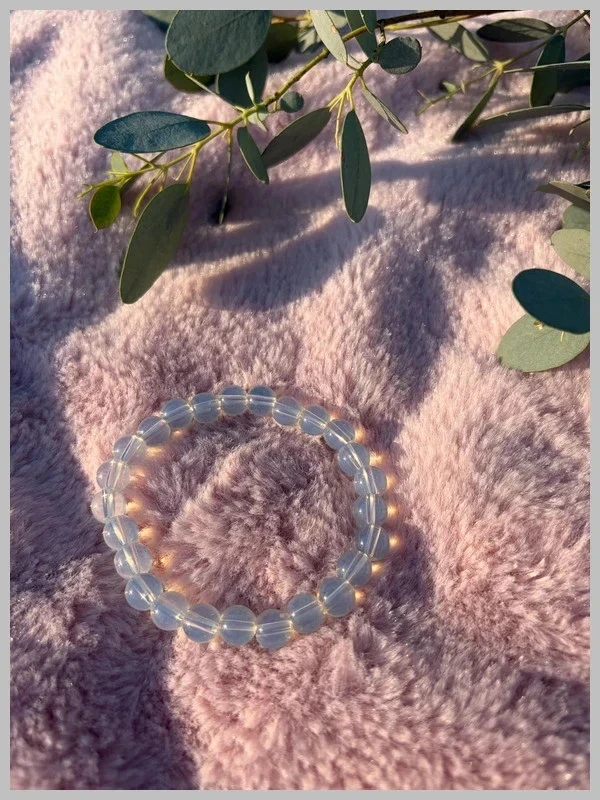 Bracelet élastique en perles transparente blanche – Effet irisé